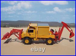 1/25 Mercedes Unimog 4x4 with front bucket and backhoe, built by Bill Ayer