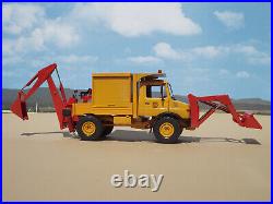 1/25 Mercedes Unimog 4x4 with front bucket and backhoe, built by Bill Ayer