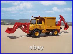 1/25 Mercedes Unimog 4x4 with front bucket and backhoe, built by Bill Ayer