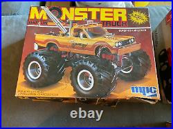 4 vintage 80s MPC and AMT monster truck, funny car model kits. Unused in box