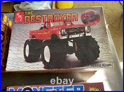 4 vintage 80s MPC and AMT monster truck, funny car model kits. Unused in box