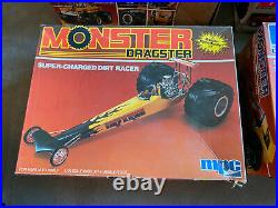 4 vintage 80s MPC and AMT monster truck, funny car model kits. Unused in box