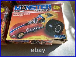 4 vintage 80s MPC and AMT monster truck, funny car model kits. Unused in box