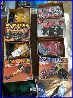 4 vintage 80s MPC and AMT monster truck, funny car model kits. Unused in box