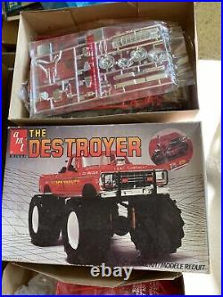 4 vintage 80s MPC and AMT monster truck, funny car model kits. Unused in box