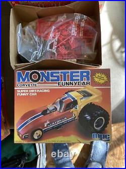 4 vintage 80s MPC and AMT monster truck, funny car model kits. Unused in box