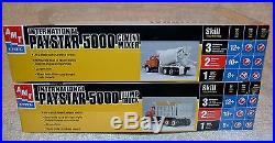 AMT INTERNATIONAL PAYSTAR 5000 DUMP TRUCK AND CEMENT MIXER NEW SEALED LOT OF 2