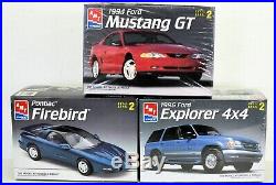 LOT 4 Three (3) different 1/25 scale AMT/ERTL FORD & PONTIAC MODEL CAR kits