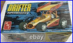 Vintage AMT Plastic Model Kits include iconic racing vehicles Factory Sealed Lot
