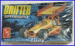 Vintage AMT Plastic Model Kits include iconic racing vehicles Factory Sealed Lot